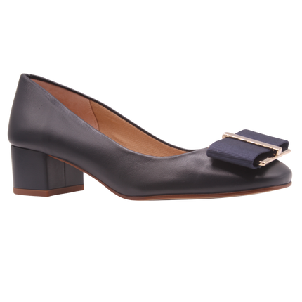 navy leather low block heel with gold metal and navy grosgrain buckle detail square toe slip on heel. angle view 