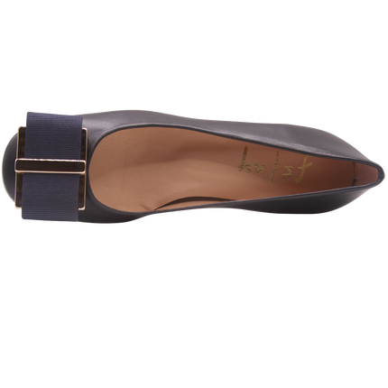 top of navy leather low block heel with gold metal and navy grosgrain buckle detail square toe slip on heel. 