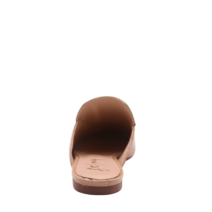 Taupe crocodile-embossed leather mule with a pointed toe, low heel, and a gold buckle detail on the top.  back view 