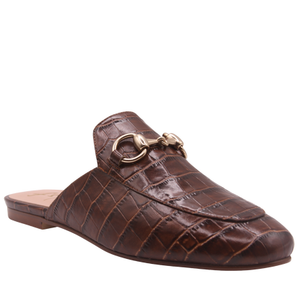 Brandy crocodile-embossed leather mule with a pointed toe, low heel, and a gold buckle detail on the top.  Angle View 