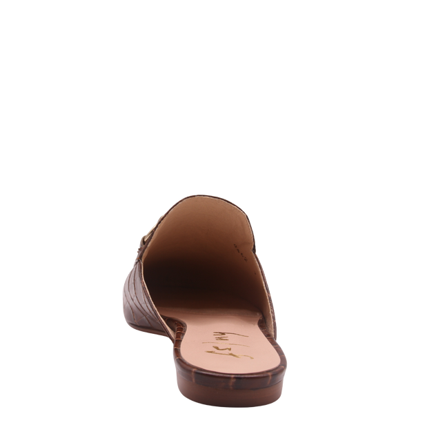 Brandy crocodile-embossed leather mule with a pointed toe, low heel, and a gold buckle detail on the top.  Back View 