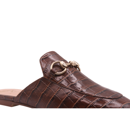Close Up of Brandy crocodile-embossed leather mule with a pointed toe, low heel, and a gold buckle detail on the top.  
