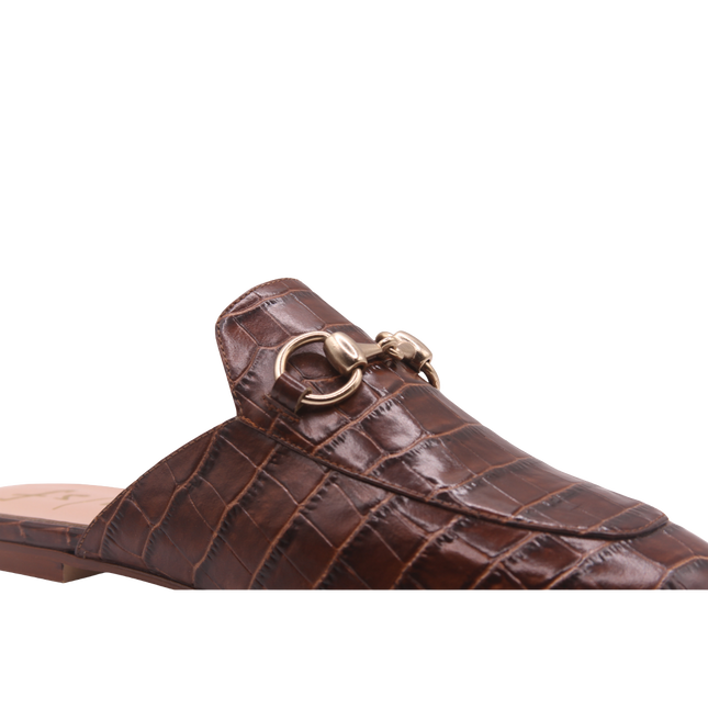 Close Up of Brandy crocodile-embossed leather mule with a pointed toe, low heel, and a gold buckle detail on the top.  