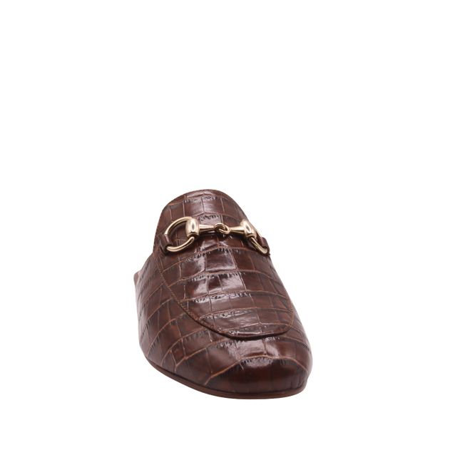 Brandy crocodile-embossed leather mule with a pointed toe, low heel, and a gold buckle detail on the top.  Front View 