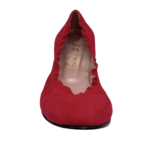 red suede ballet flat with a rounded toe and elasticated topline front view