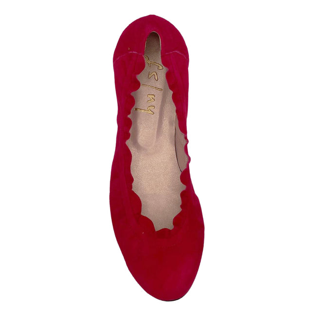 red suede ballet flat with a rounded toe and elasticated topline top view