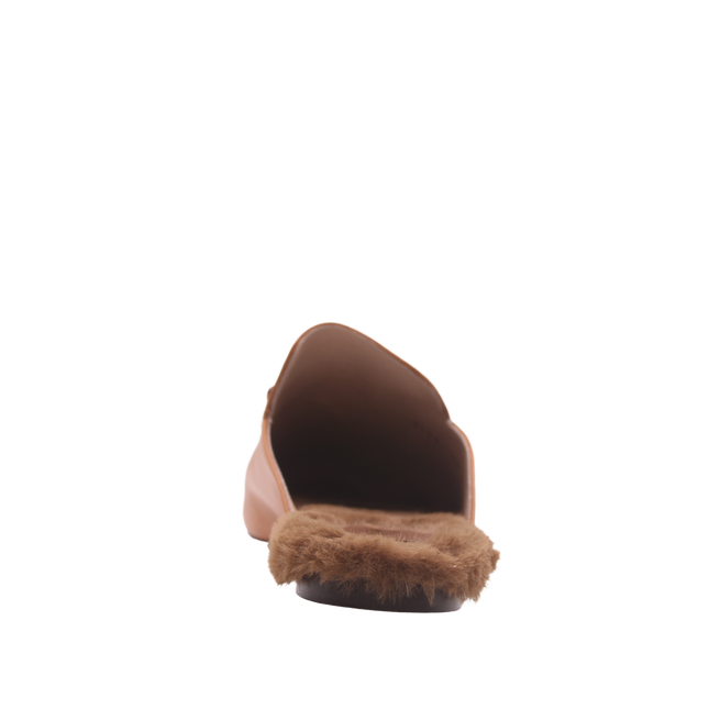 Cognac brown leather mule with a pointed toe, low heel, gold buckle detail on the upper, and a soft fur-lined footbed. Back view 