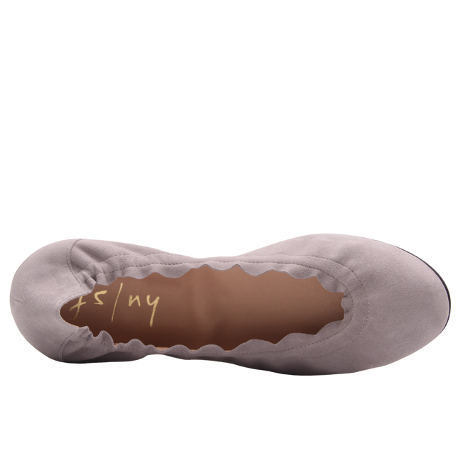 light pink suede ballet flat with a rounded toe and elasticated topline. top view