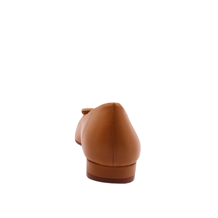 Cognac leather flat with a square toe, a small heel for slight lift, and a textured cognac buckle with gold detailing on the toe box back view 