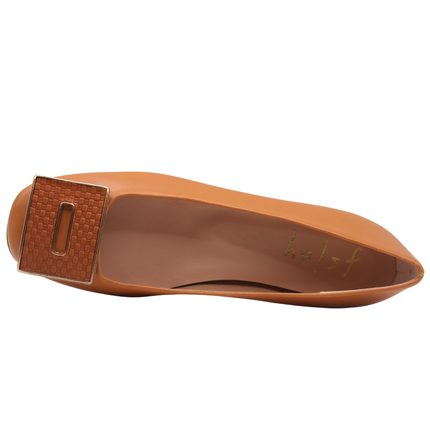 Cognac leather flat with a square toe, a small heel for slight lift, and a textured cognac buckle with gold detailing on the toe box top view 