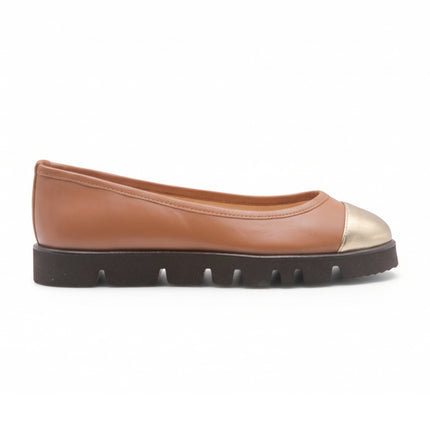 cognac leather flat with a rounded toe, contrasting BRONZE leather cap toe, and a thick treaded sole side view 