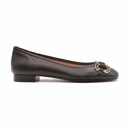 Black leather ballet flat with a low heel and a gold-accented buckle detail on the front. side view 
