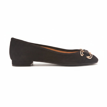 black suede ballet flat with a low heel and a gold-accented buckle detail on the front. side view 