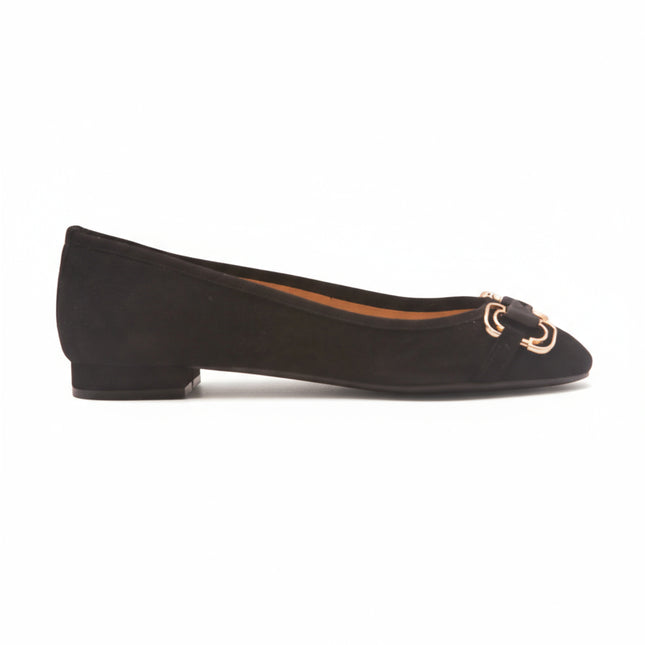 black suede ballet flat with a low heel and a gold-accented buckle detail on the front. side view 