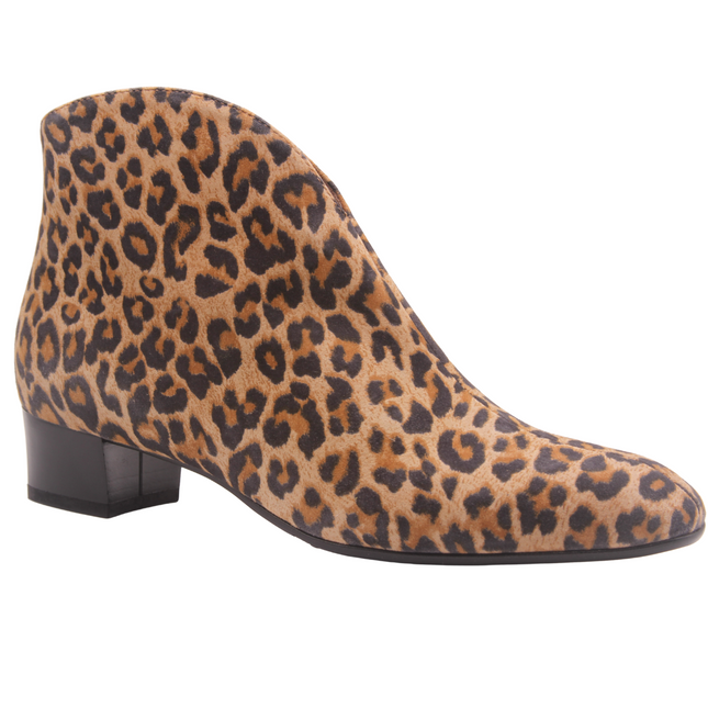 Leopard suede ankle boot with a low block heel and a smooth, minimal silhouette. Angle view 