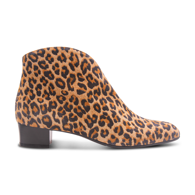 Leopard suede ankle boot with a low block heel and a smooth, minimal silhouette. Side view
