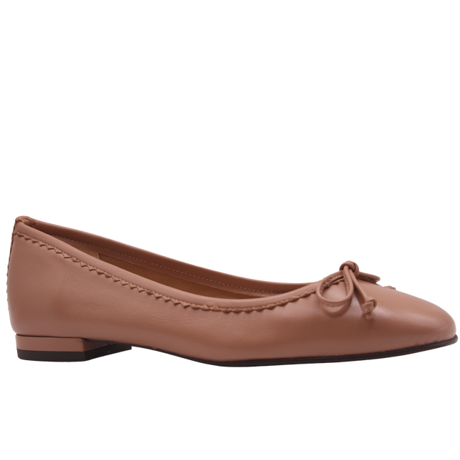 cappuccino leather ballet flat with a rounded toe, leather trim on top line, and a small bow on the front. - angle view 