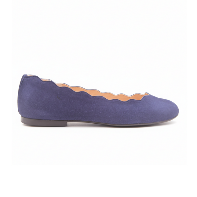Side view of jigsaw navy suede flat. 
