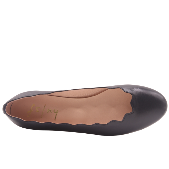Top view of jigsaw navy leather flat. 