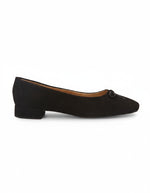 Black suede ballet flat with black bow side view 