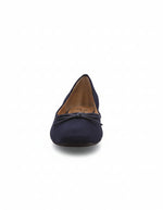 Navy blue shoe with a bow on a white background