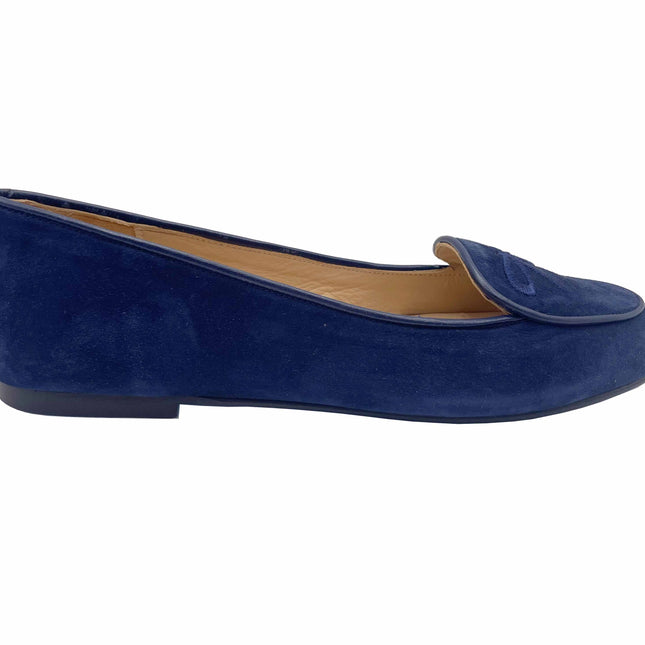 Navy blue suede flat shoe with a cushioned leather foot-bed and a rubber sole, side view.