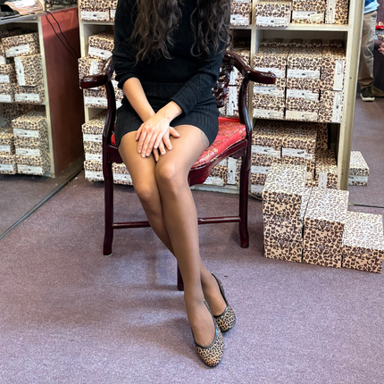model wearing the shoes with black tights