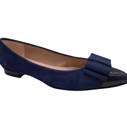 navy suede ballet flat with a pointed patent toe and a layered ribbon bow on the front. angle view 