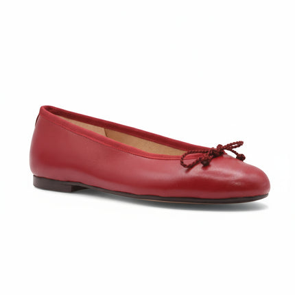 Red ballerina shoe with a DRAWSTRING bow on a white background