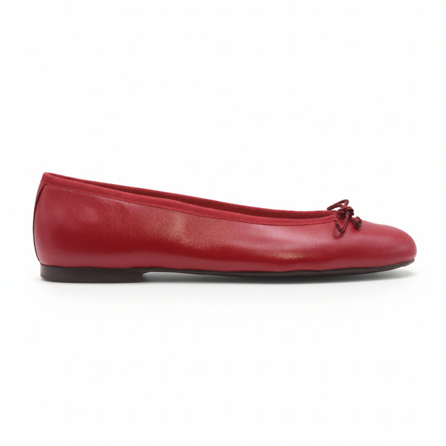 Red flat shoe with a DRAWSTRING bow on a white background