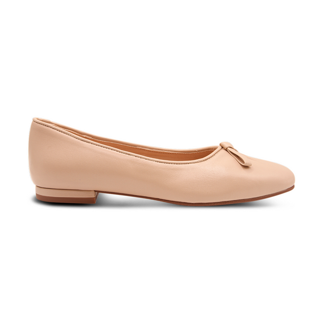 Beige leather ballet flat with a soft square toe, an elongated toe box, and a small beige leather flatten bow detail on the front. side view 