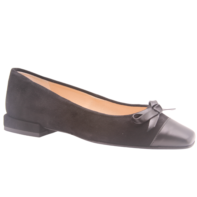 black suede ballet flat with a low heel, leather cap toe, and a small matching leather bow on the front square tow angle view