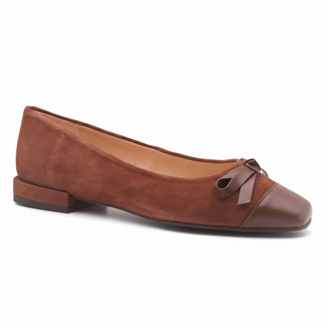 Brown suede ballet flat with a low heel, leather cap toe, and a small matching leather bow on the front square tow angle view