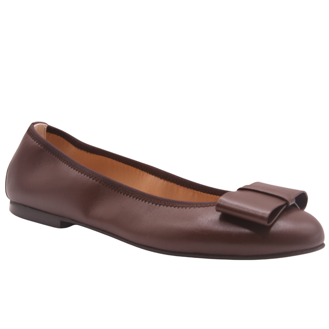 chocolate brown leather ballet flat with a rounded toe and a large folded bow accent on the front. angle