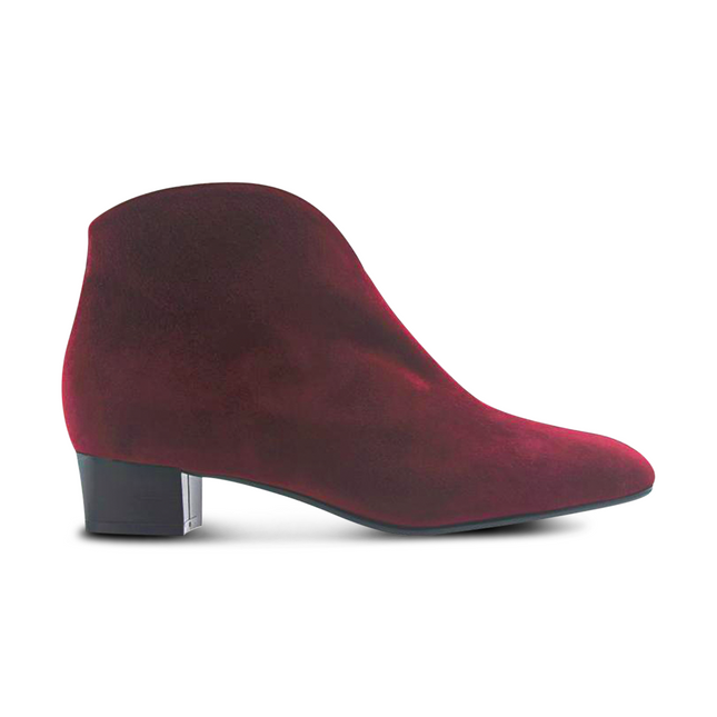 Burgundy suede ankle boot with a low block heel and a smooth, minimal silhouette. side view