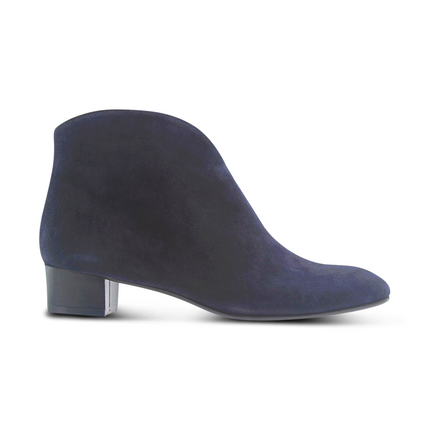 Navy suede ankle boot with a low block heel and a smooth, minimal silhouette. Side View