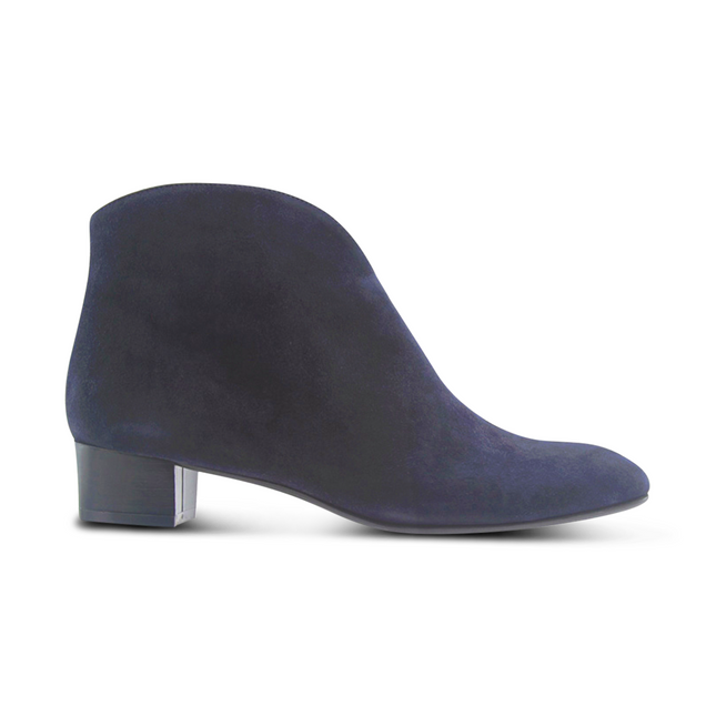Navy suede ankle boot with a low block heel and a smooth, minimal silhouette. Side View