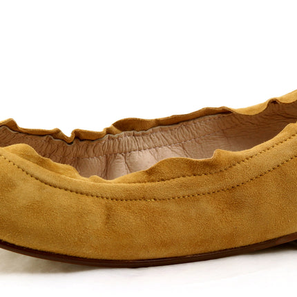 honey suede ballet flat with a rounded toe and elasticated topline. angle view 