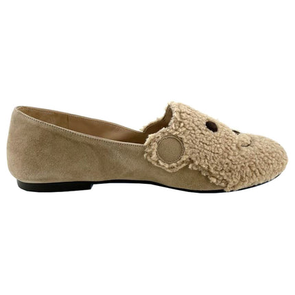 Beige suede loafer with a textured teddy-fleece upper featuring stitched teddy bear face outline side view