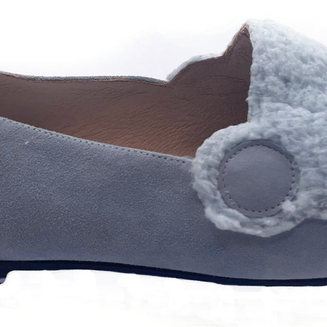blue suede loafer with a textured teddy-fleece upper featuring stitched teddy bear face outline side view