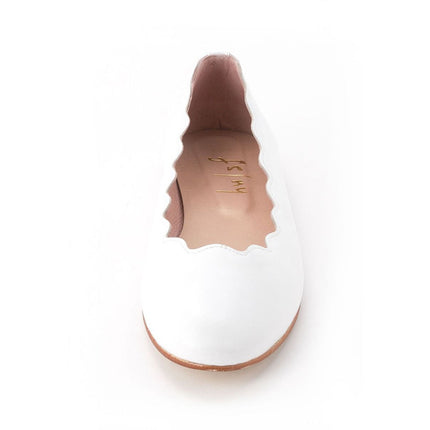 Front view of jigsaw white leather flat. 