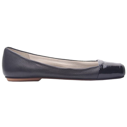 Black leather ballet flat with a square toe and a glossy patent band across the toe box side view 