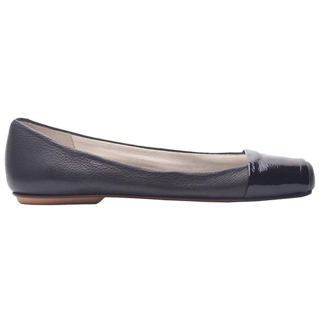 Black leather ballet flat with a square toe and a glossy patent band across the toe box side view 